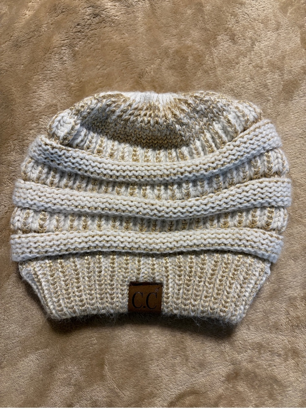 #99 - MUST GO! C.C Women’s Cream & Gold Knit Beanie with Ponytail Hole.